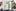 green door with Yale Assure Lock and entranceway with plants and hammock banno
