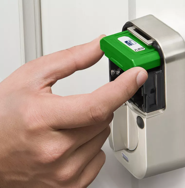 person upgrading yale lock