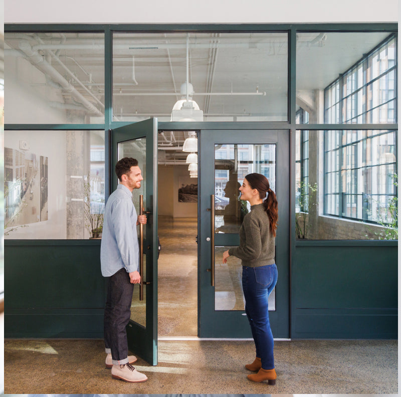 man opening the door for a woman