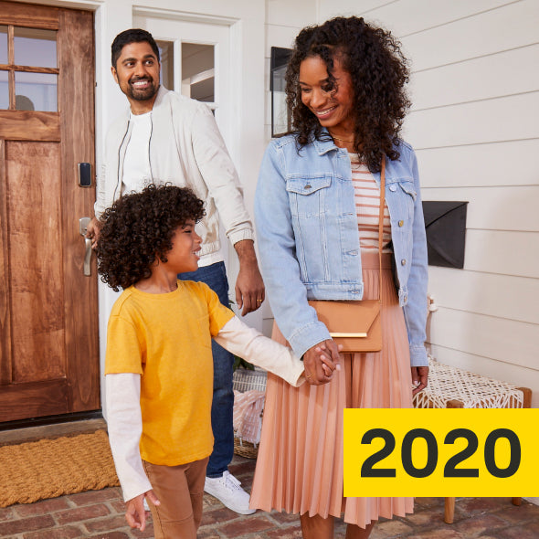 2020 card image, family leaving a house