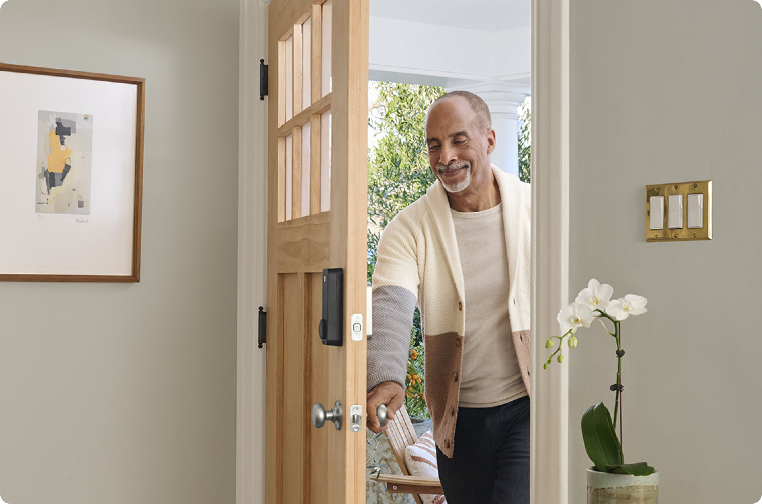 man entering his home